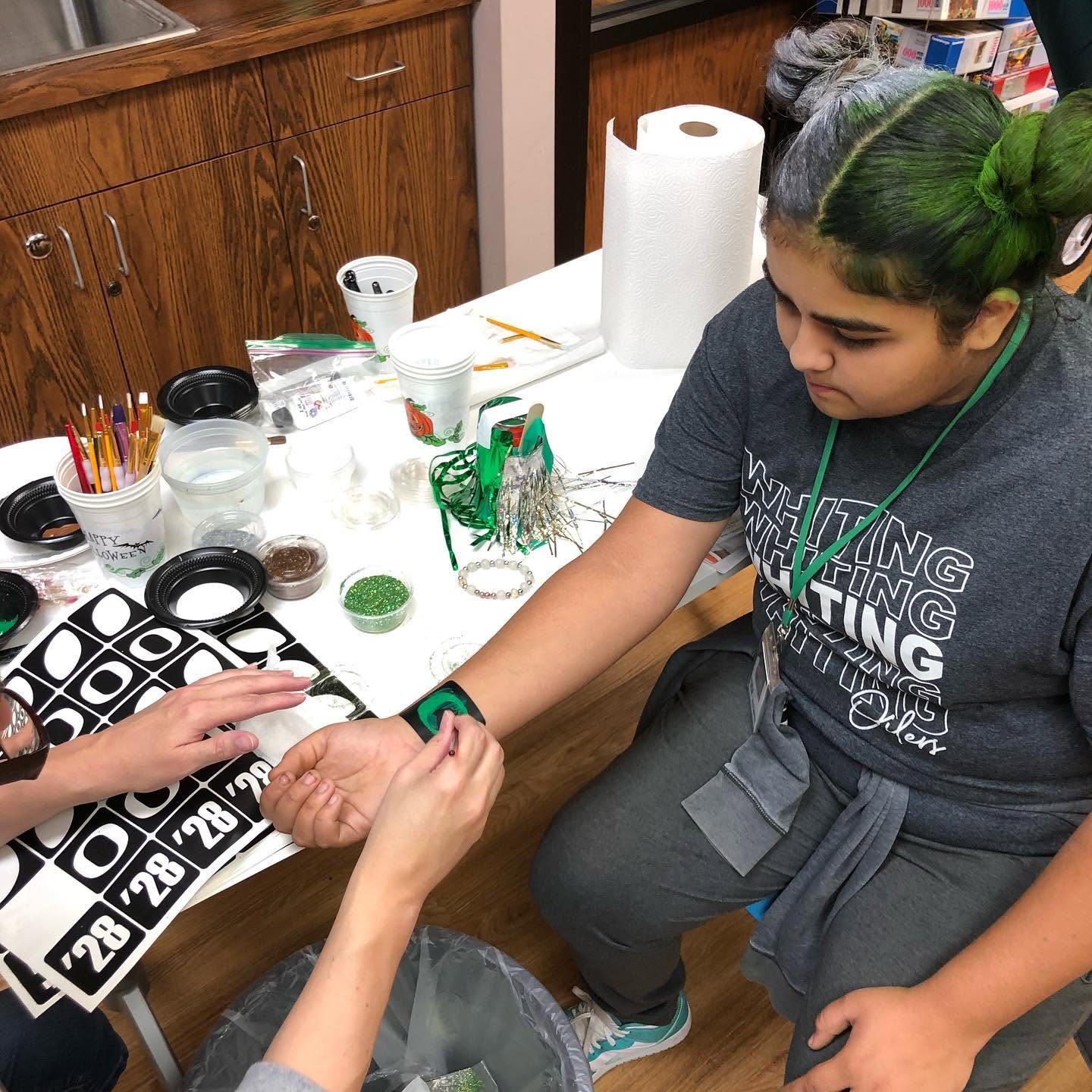 Friday Night Lights at the Library: Partnering with Your Local High School for Homecoming Fun